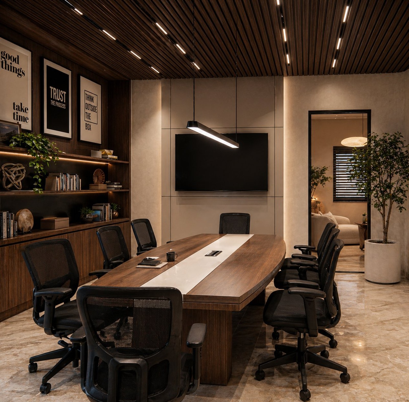 The Studio Boardroom — TV wall, frames and lounge view